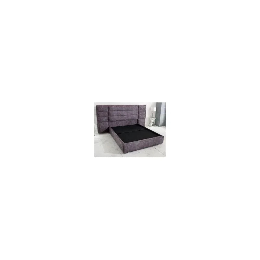 Grey upholstered ottoman storage bed with high panel headboard open in modern bedroom