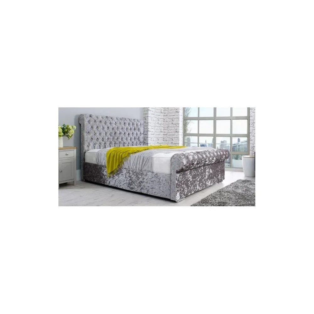 Silver crushed velvet bed with button-tufted headboard in bright modern bedroom