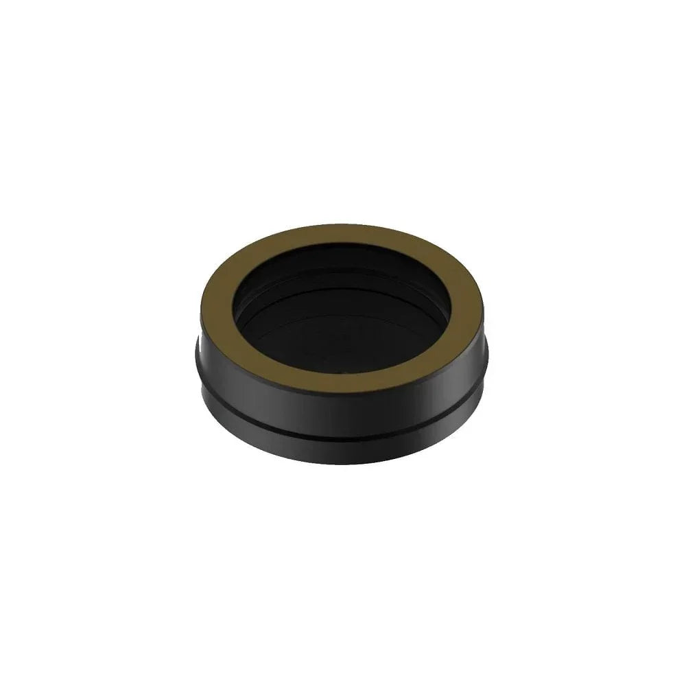 Round black furniture leg protector with brown edge, viewed from above on white background
