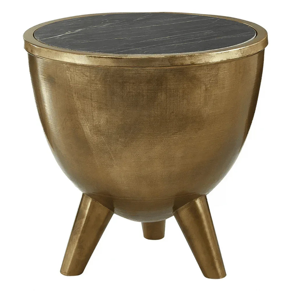 Round gold side table with black marble top and three legs