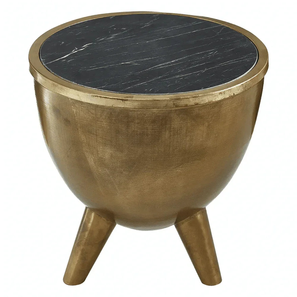 Round gold side table with black marble top and three legs
