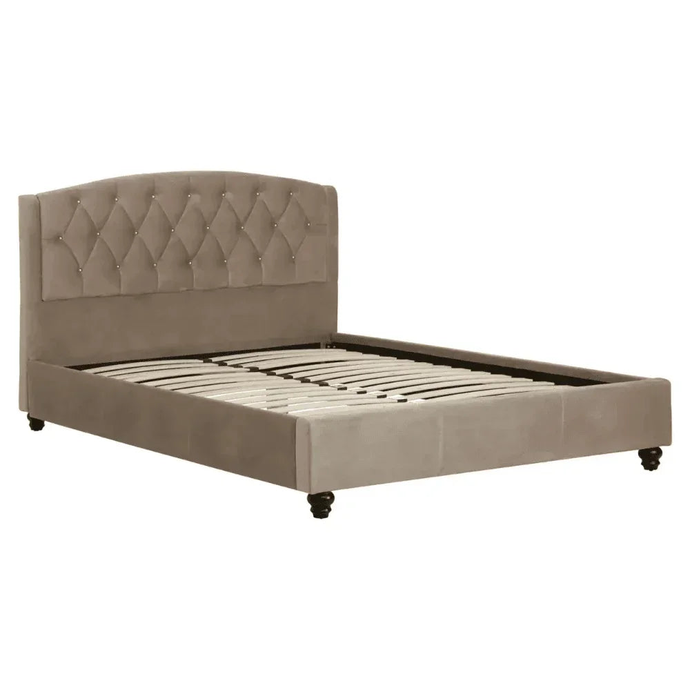 Beige upholstered bed frame with tufted headboard and wooden slats, angled side view