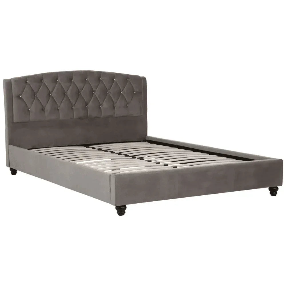 Grey upholstered bed frame with tufted headboard and wooden slats, angled front view