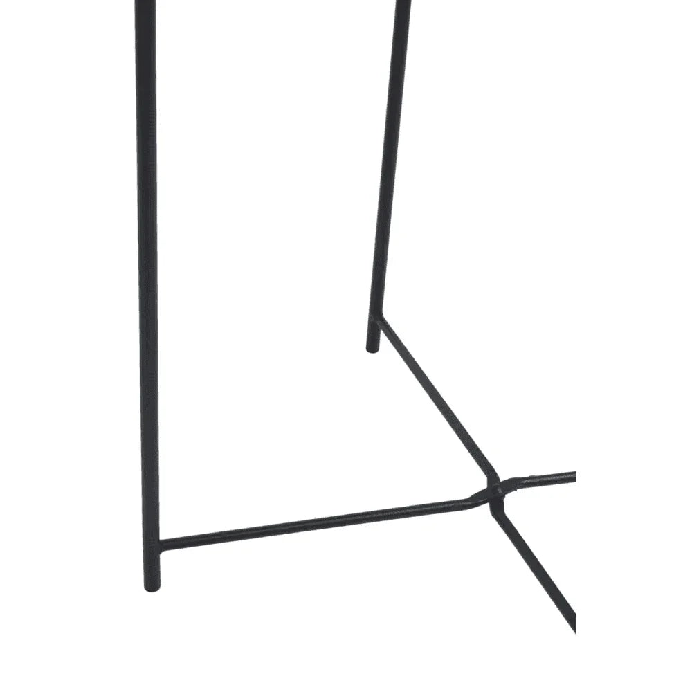 Black metal table leg with modern cross frame design, close-up furniture detail