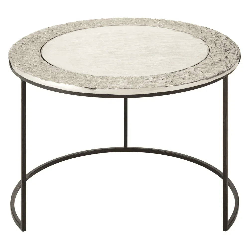 Round coffee table with textured silver top and black metal frame