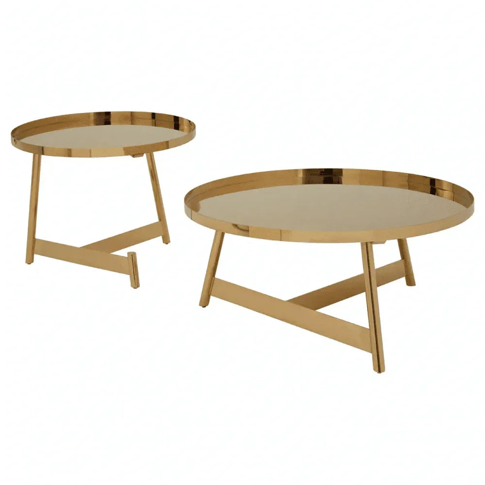 Set of two round gold metal coffee tables with mirrored tops and minimalist legs
