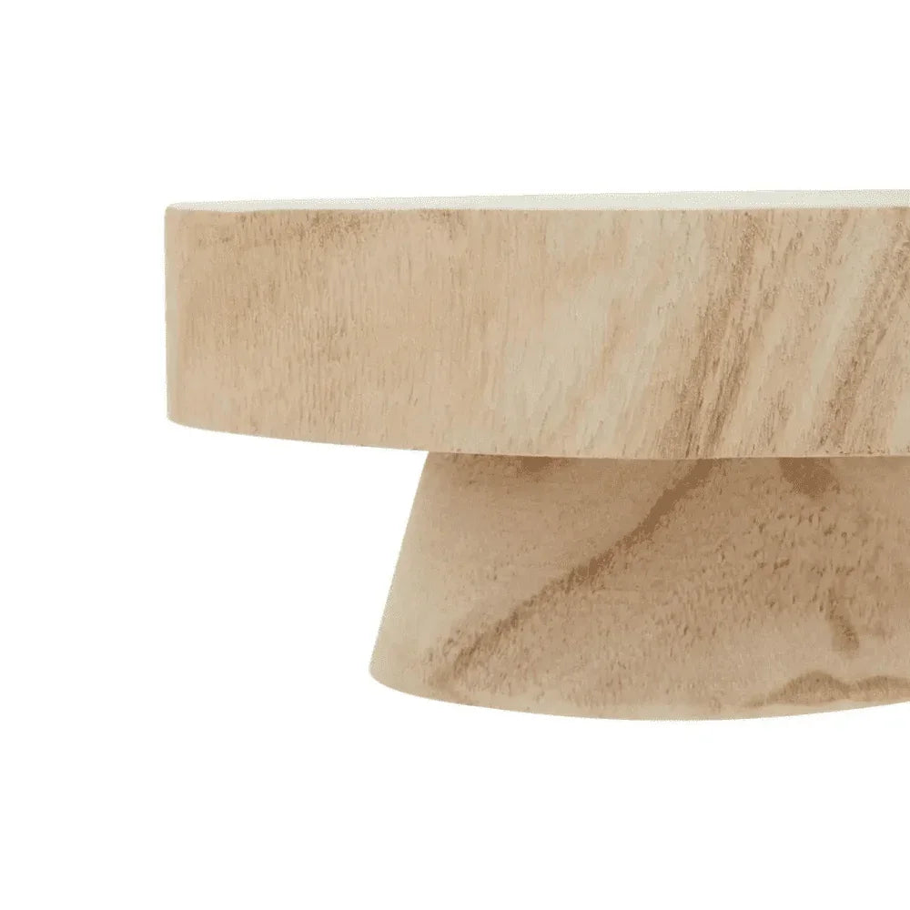 Closeup of light wood pedestal table edge with natural grain detail