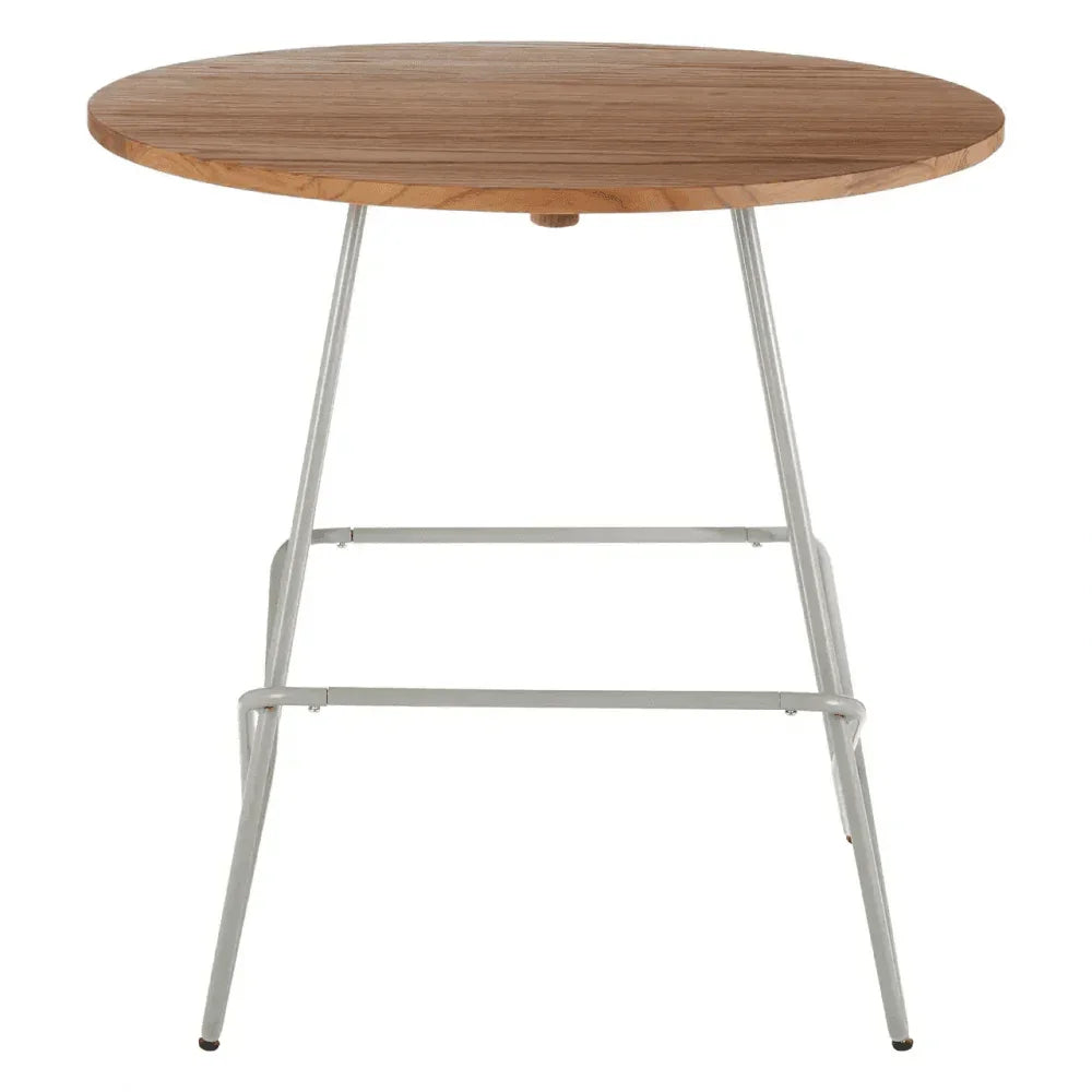 Round wooden dining table with light metal legs and natural finish