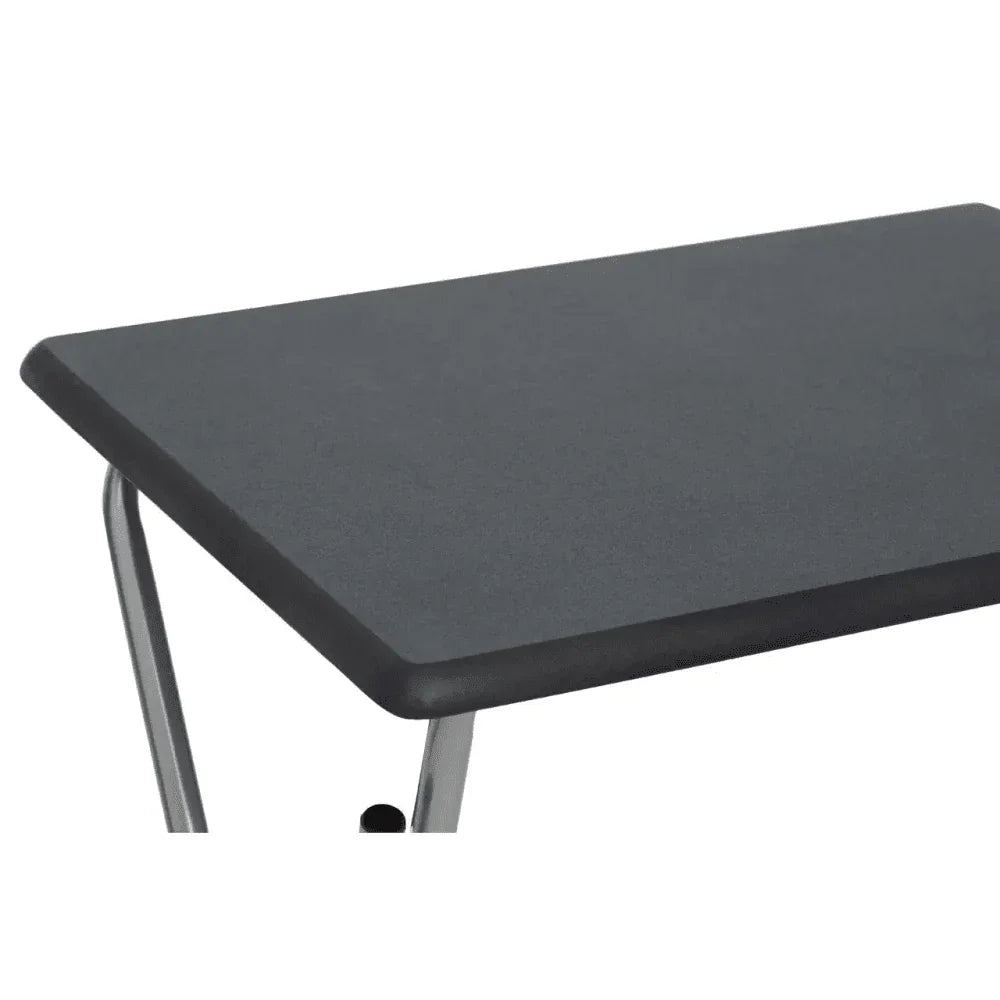 Closeup of black folding table with metal legs and rectangular top