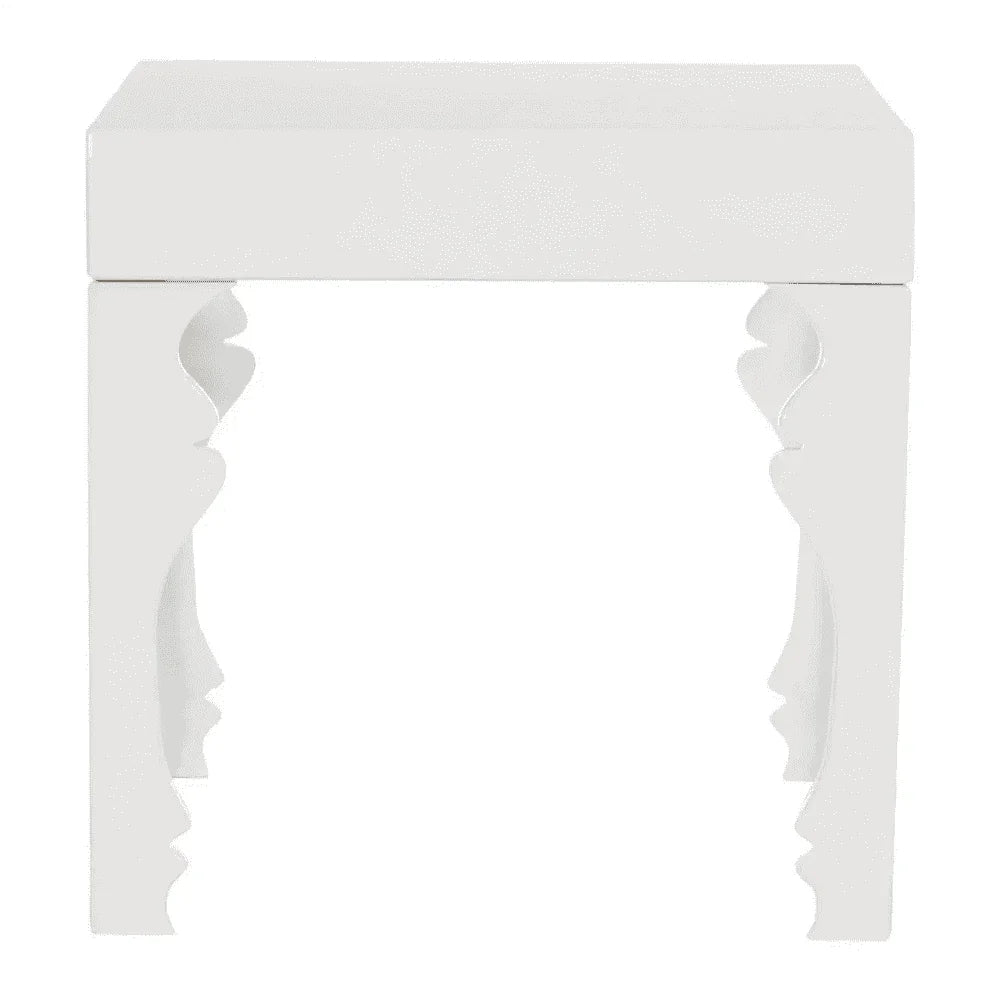 White side table with sculpted profile face legs, modern minimalist furniture design