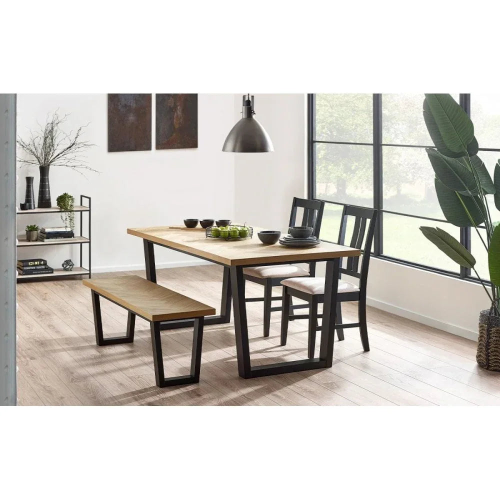 Industrial style dining table set with wood top, black metal legs, bench and chairs