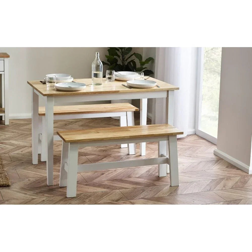 Wood dining table set with two benches, set for four, light wood top, white legs