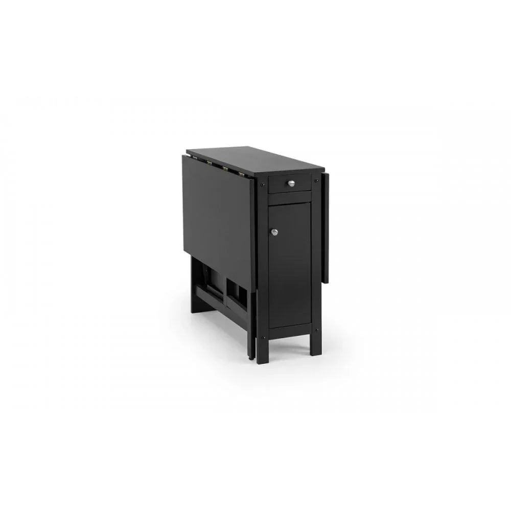 Black folding dining table with storage drawer and cabinet, shown in compact position