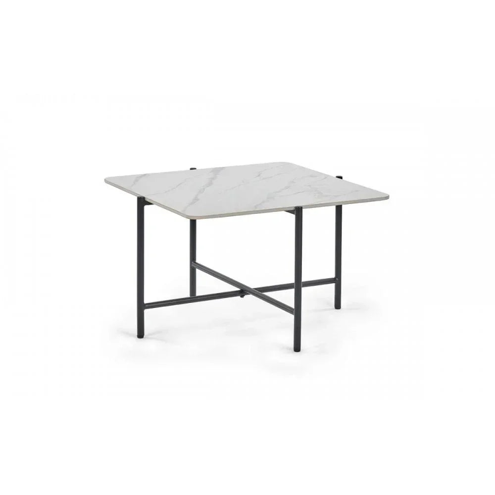Square marble dining table with white top and black metal legs