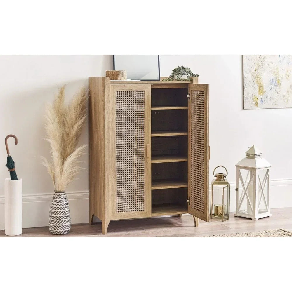 Natural wood storage cabinet with rattan doors and shelves in a modern hallway
