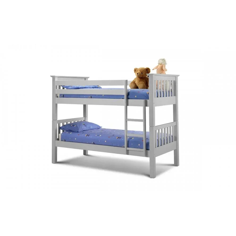Grey wooden bunk bed with blue bedding and soft toys on top bunk