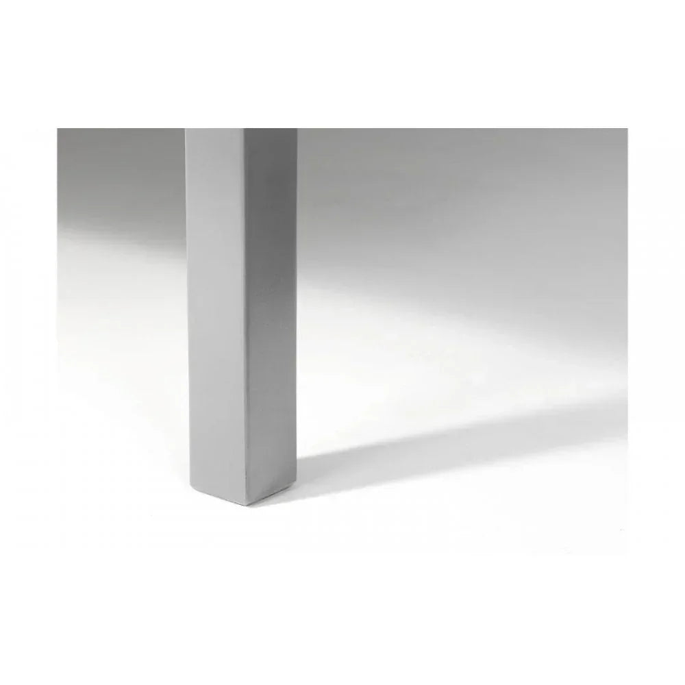 Grey metal table leg with smooth finish on white background