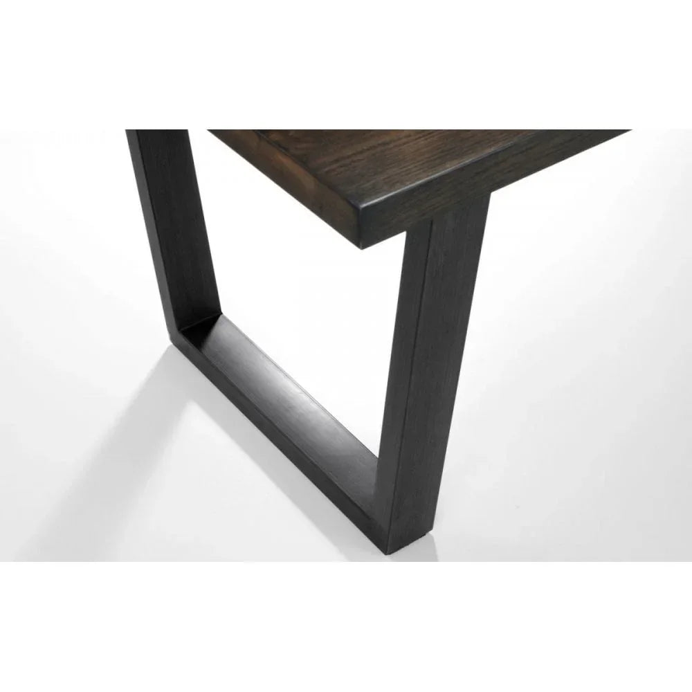 Black metal dining table leg with modern angular frame on white background