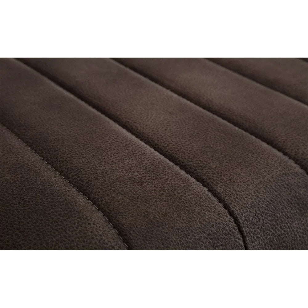 Closeup brown fabric sofa seat with horizontal stitched panels and textured upholstery