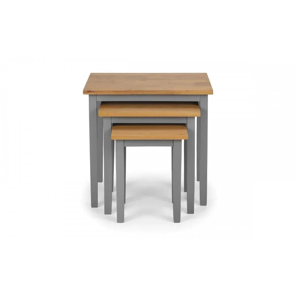 Set of three grey and oak nesting tables with square tops and straight legs, front view