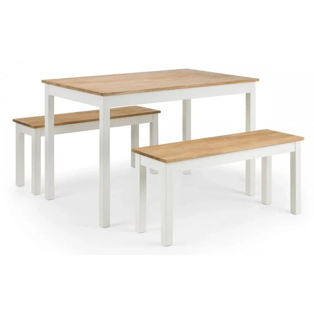 Wood dining table with white legs and two matching benches on white background