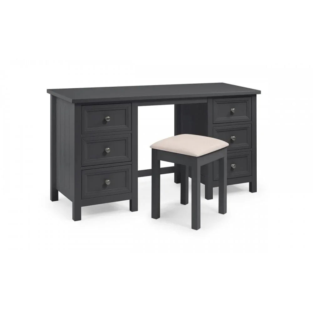 Black wooden dressing table with six drawers and matching stool with beige cushion