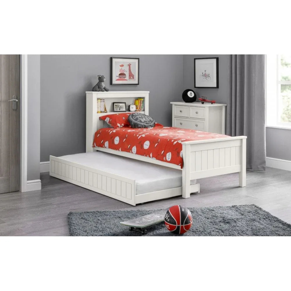 White wooden kids bed with pull-out trundle and bookshelf headboard in modern bedroom