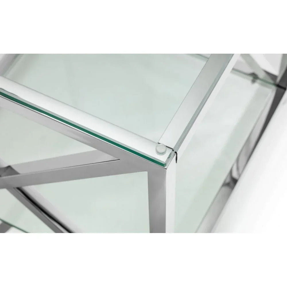 Close-up of glass coffee table with chrome metal frame and modern corner detail