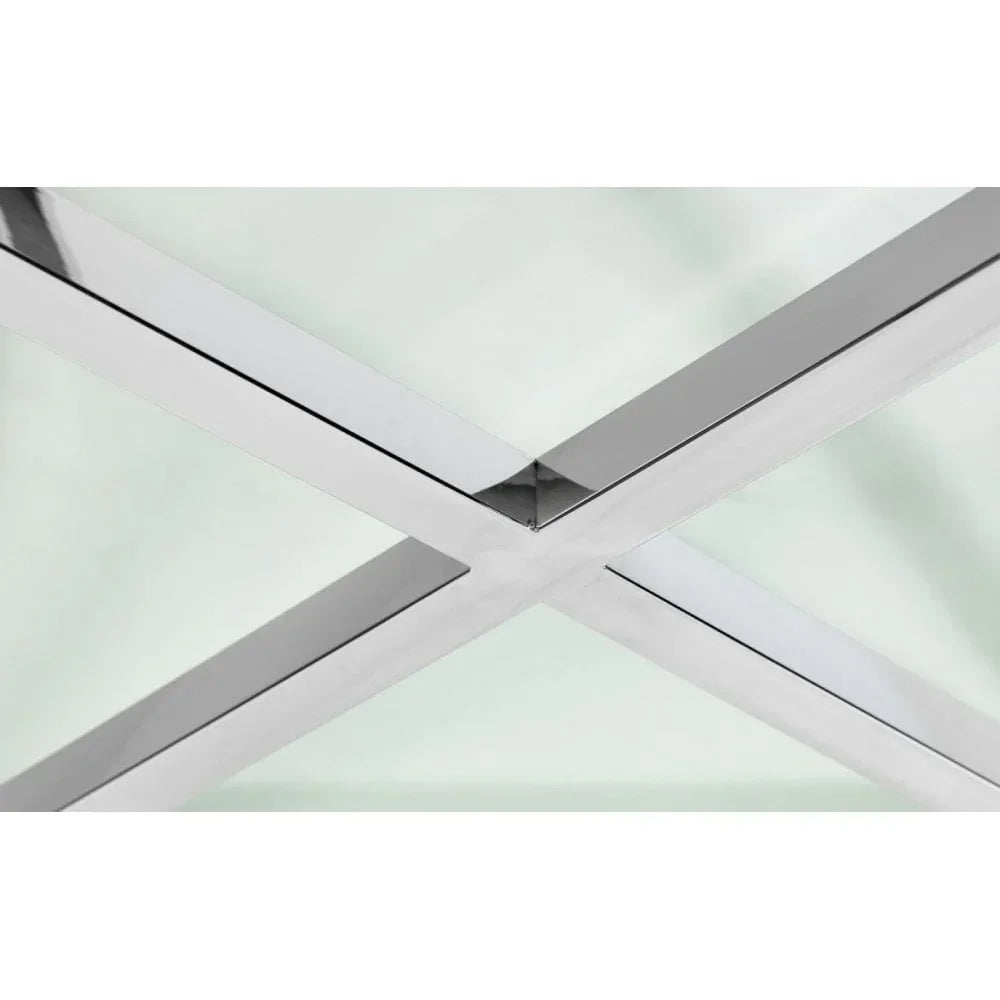 Chrome metal cross base detail on glass coffee table
