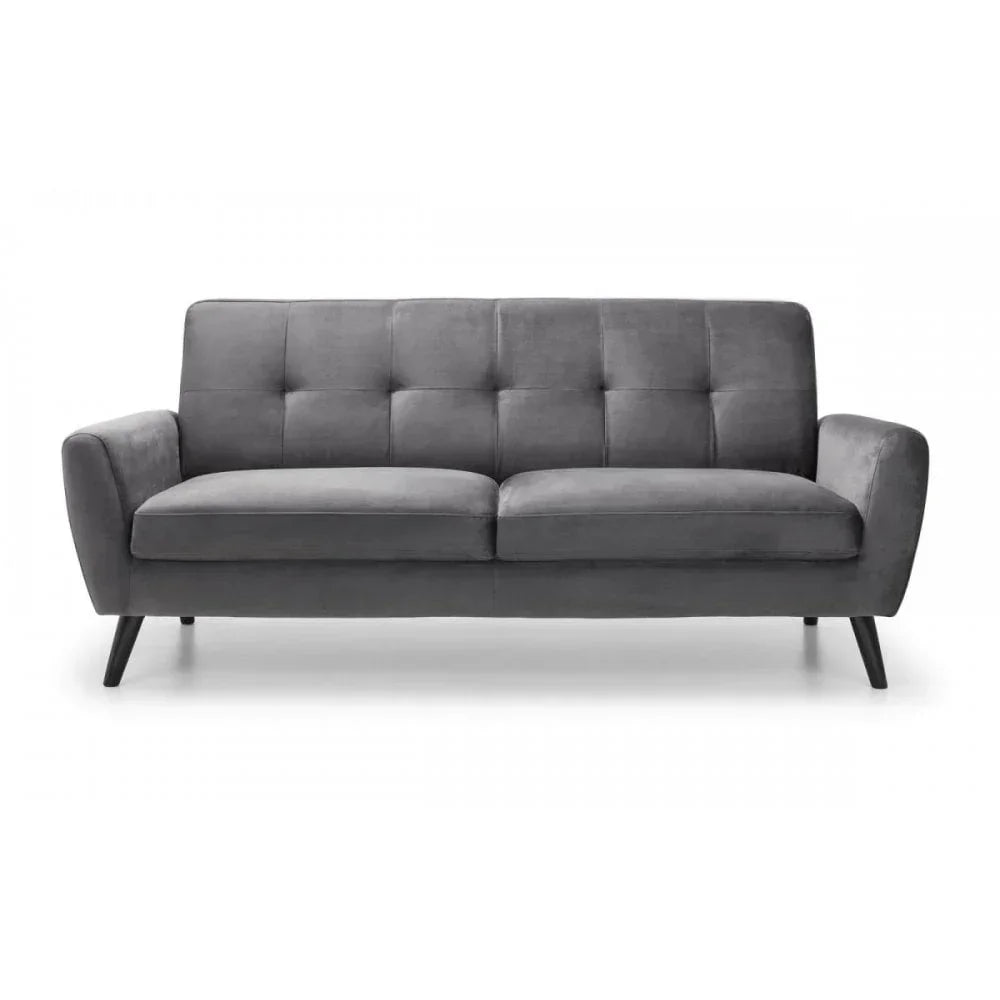 Grey velvet sofa with tufted backrest and angled wooden legs, front view