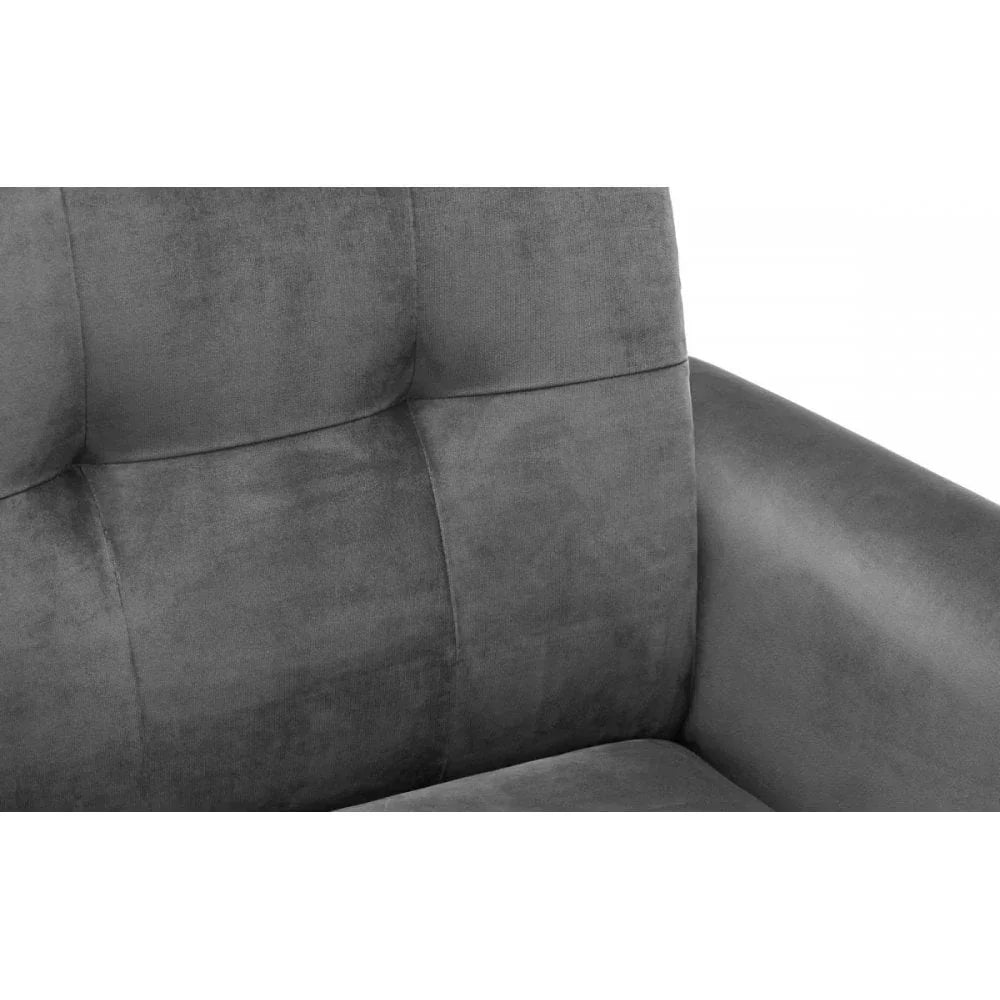Close-up of grey fabric sofa armrest and tufted backrest upholstery