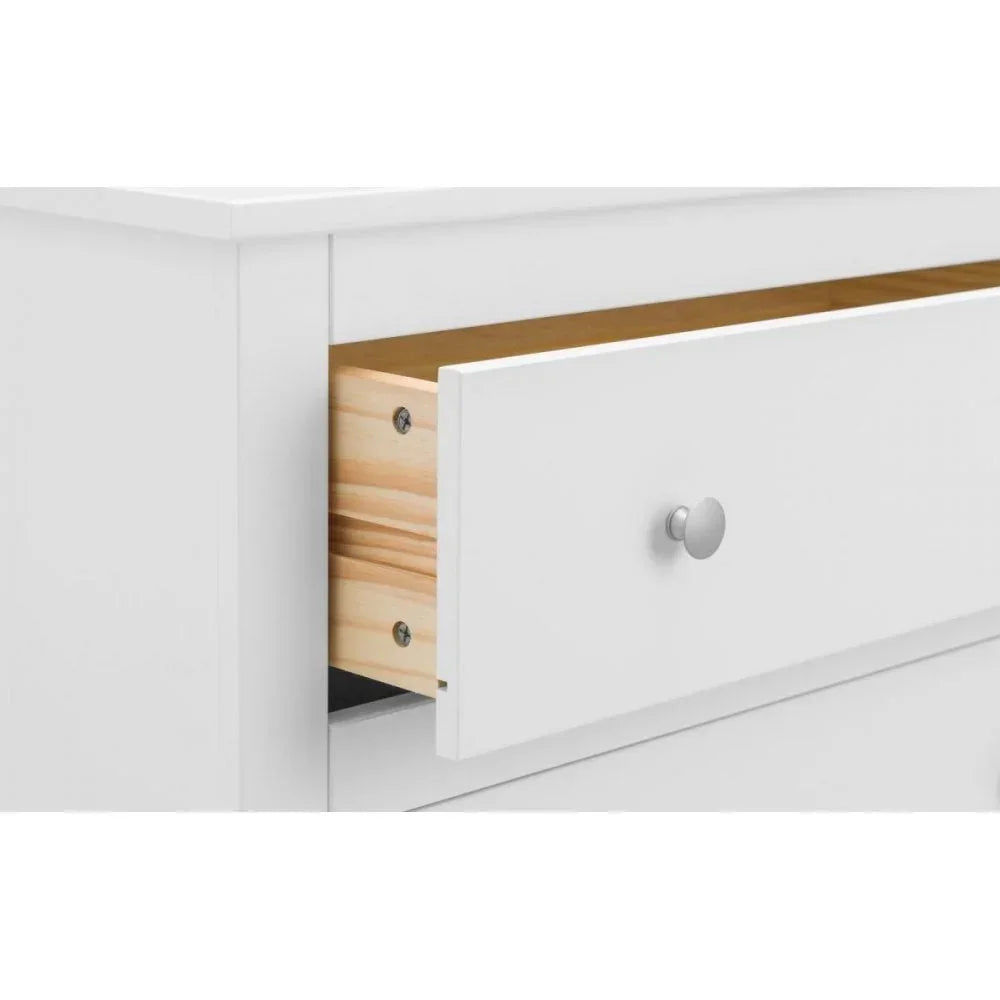 White chest of drawers with open drawer, silver knob, showing interior wood finish
