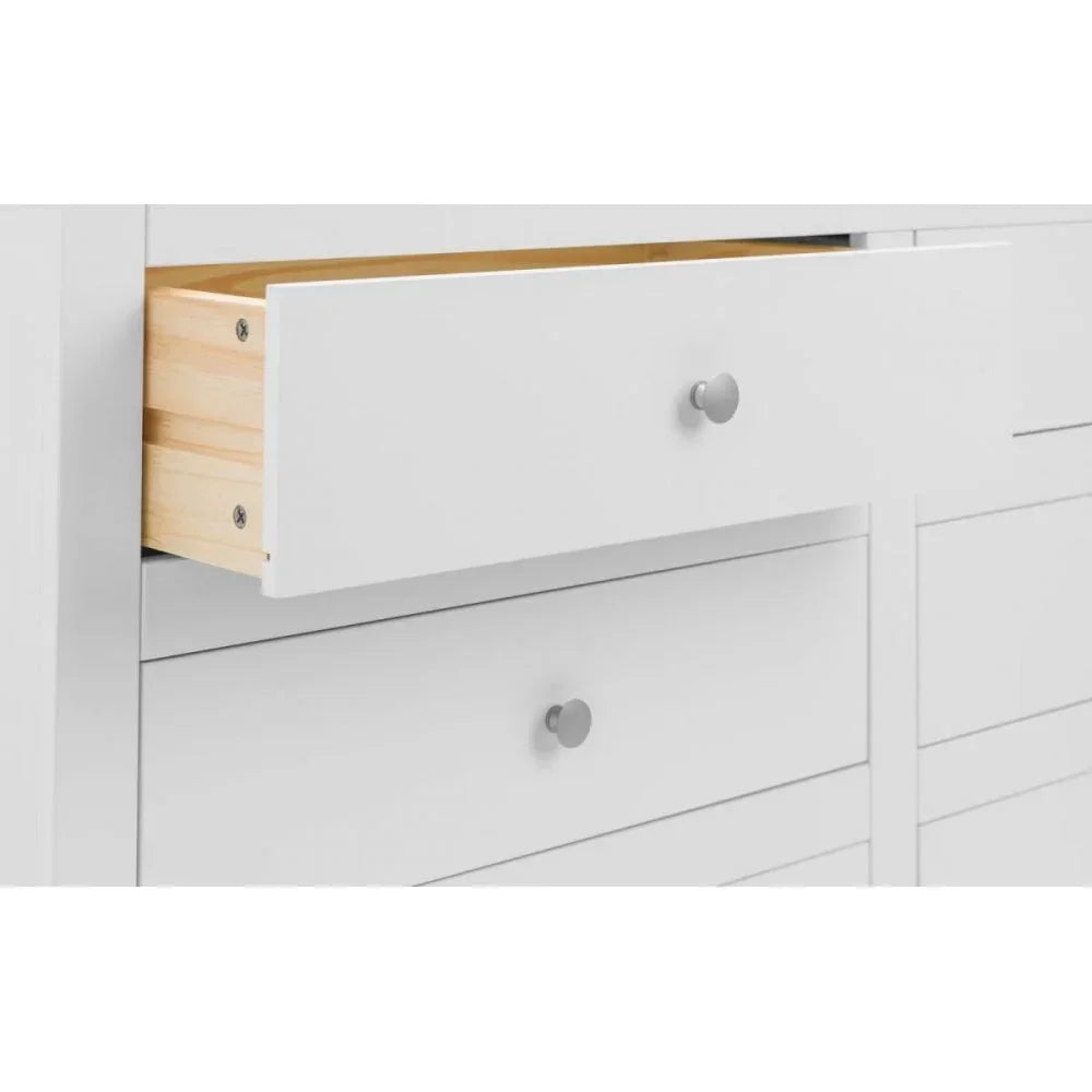 White chest of drawers with open drawer showing wood interior and round metal handle