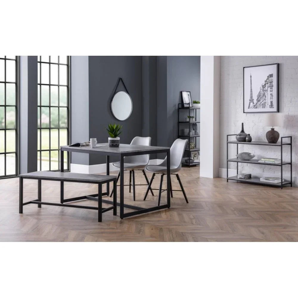 Modern dining table set with bench and white chairs in contemporary living space