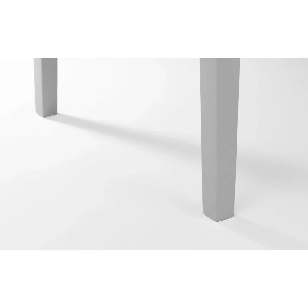 Closeup of two grey dining table legs with clean straight design on white background