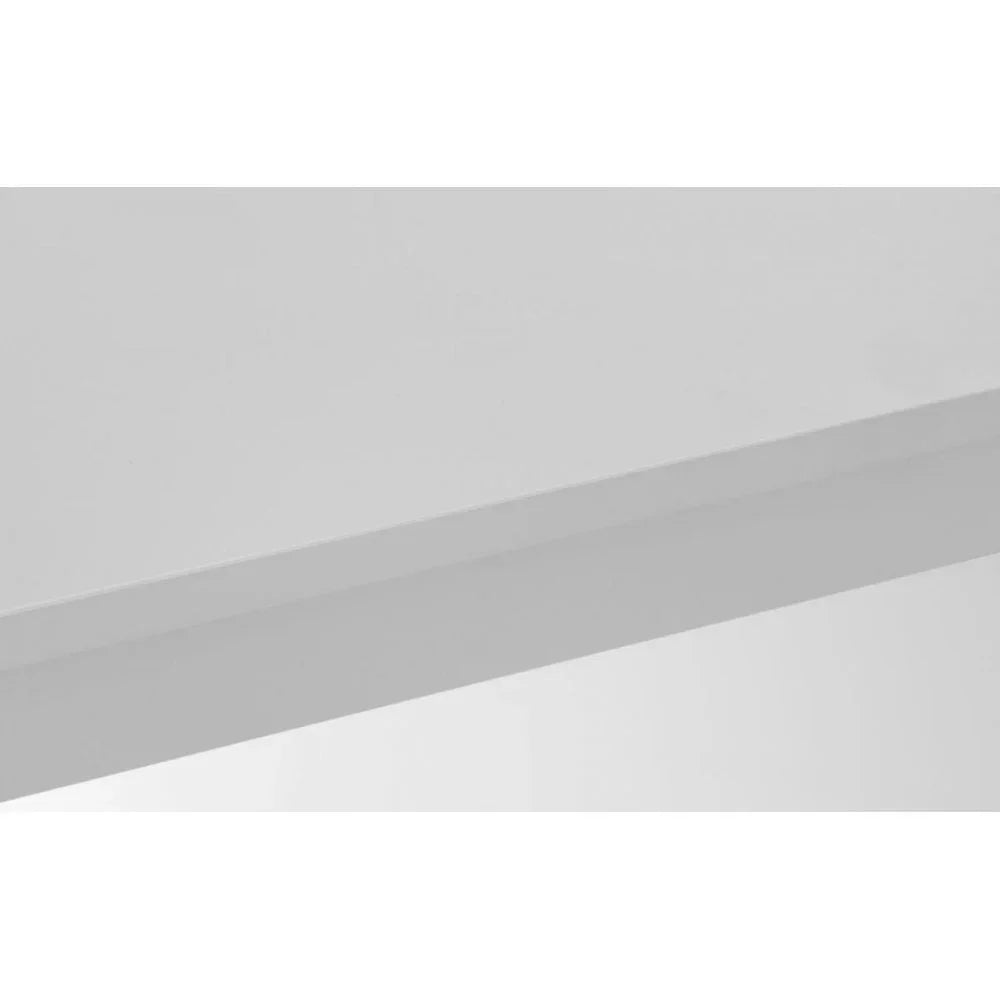 Close view of white table top with smooth finish and straight edge detail