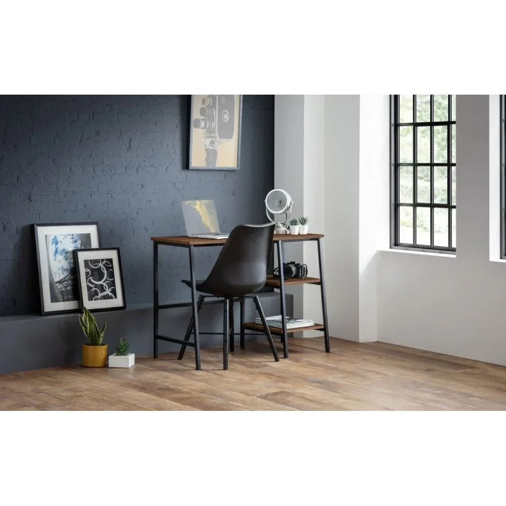 Industrial style writing desk with black chair and shelves in modern home office
