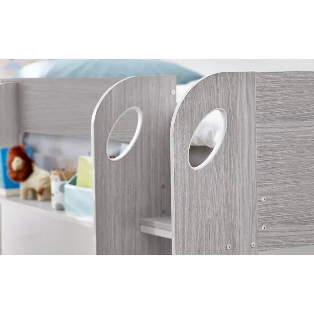 Grey wood kids bed with rounded ladder cutouts and toy storage underneath
