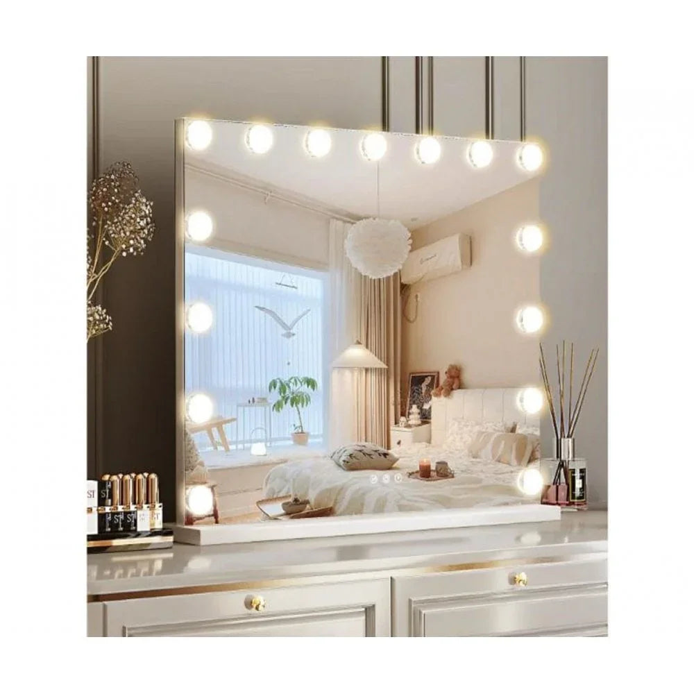 Vanity mirror with LED lights on a white dressing table, makeup and decor beside mirror