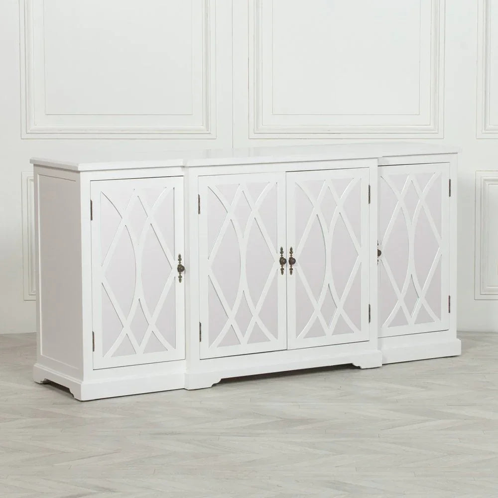 White sideboard cabinet with geometric panel doors and brushed metal handles