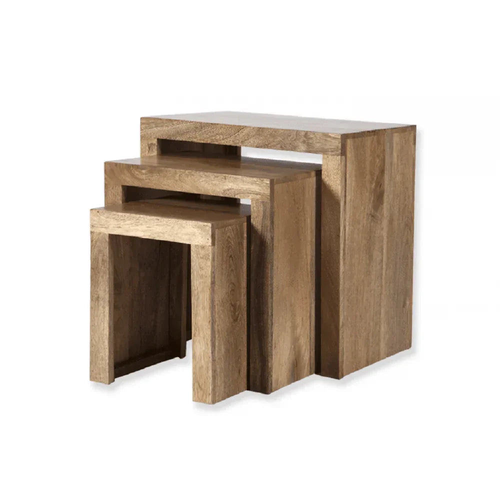 Set of three solid wood nesting tables with natural finish on white background