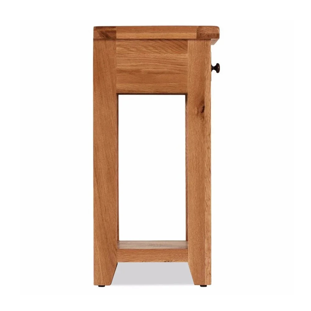Side view of oak console table with visible wood grain and lower shelf