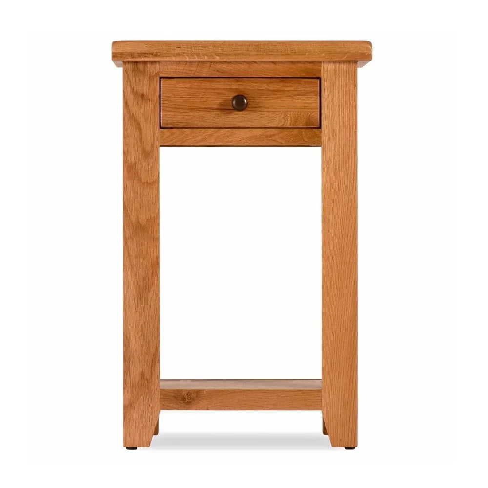 Oak bedside table with single drawer and lower shelf, front view