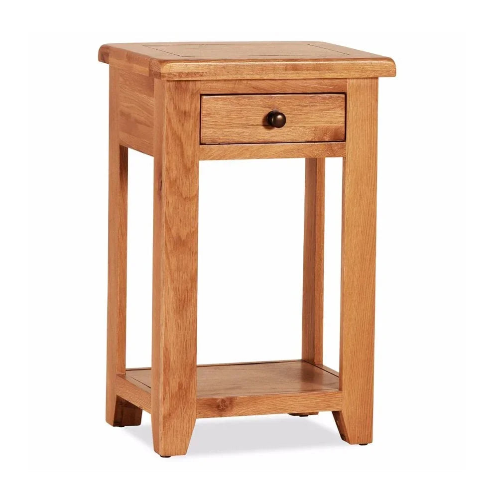 Oak bedside table with single drawer and lower shelf, light wood finish, front angle