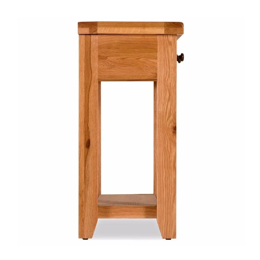 Side view of solid oak console table with shelf and visible wood grain