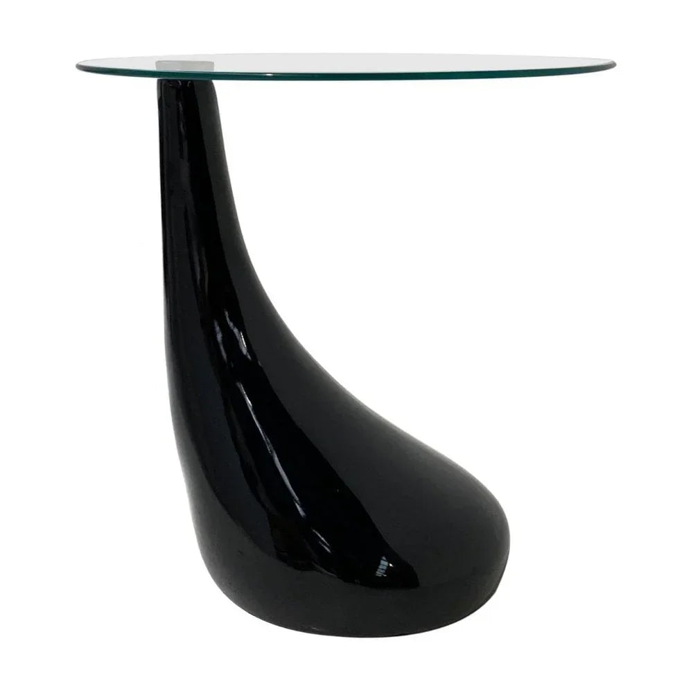 Modern black side table with curved base and round glass top