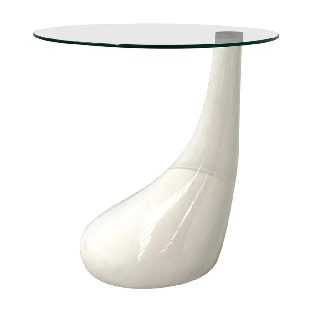 Modern glass top side table with white sculpted base, contemporary furniture design
