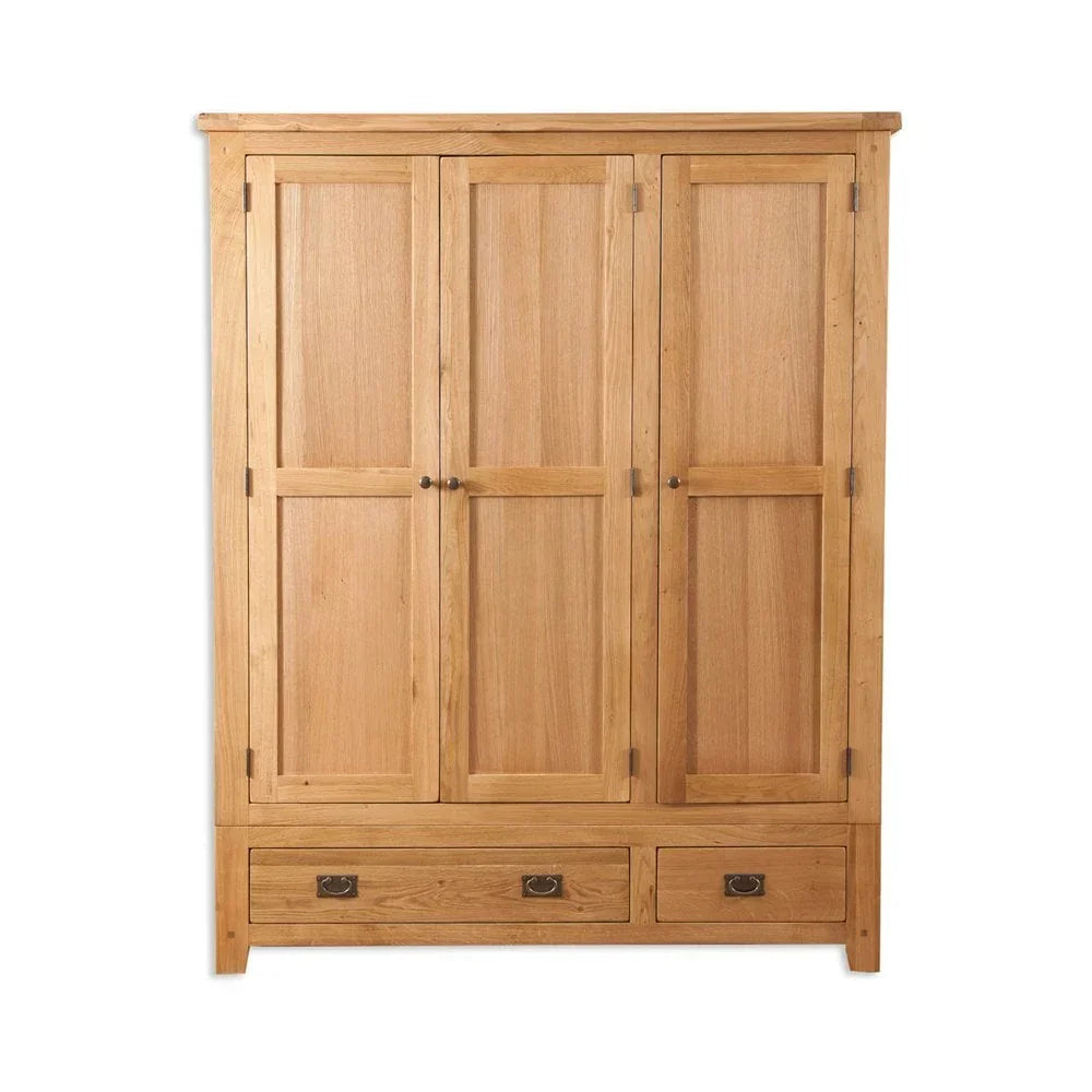 Three door oak wardrobe with two drawers at base, metal handles, plain panel design