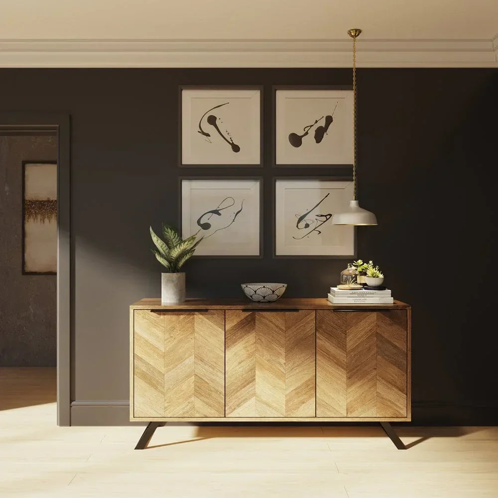Chevron wood sideboard with decor in modern dining room, dark wall and abstract art