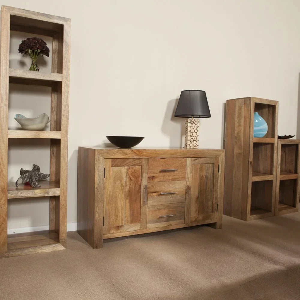 Solid wood sideboard with matching bookshelves in living room setting